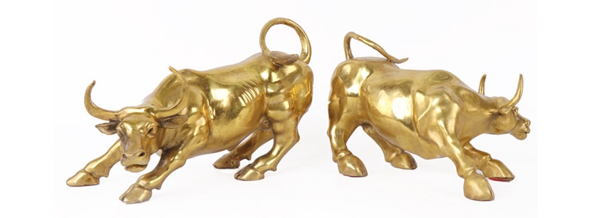 Gold color miniature charging bull